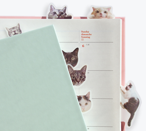 Cute adhesive cat tabs keep your pages marked with adorably playful ...