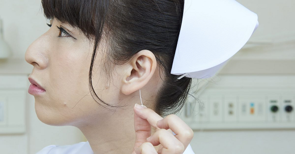 Nurse Sticking Scissors In Her Mouth And Other Photos From Japans